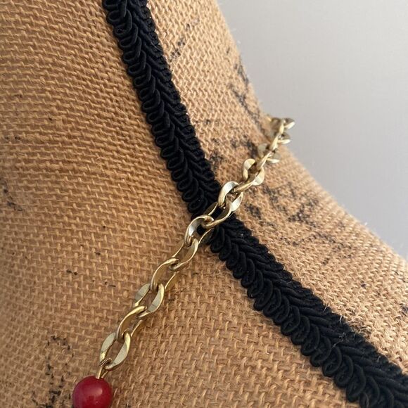 Fossil Red Beaded Necklace with Gold Tone Flower Charm - Picture 4 of 5